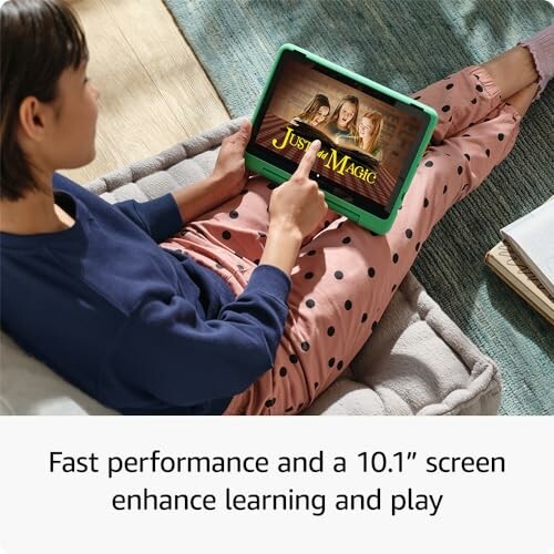 Child using a tablet for learning and play