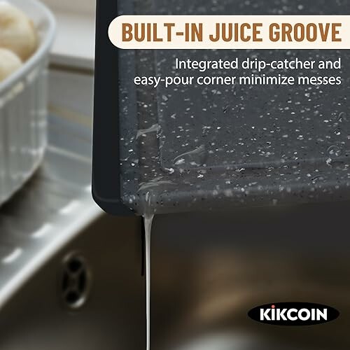 Cutting board with built-in juice groove over sink.