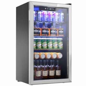 Glass door mini fridge with assorted drinks.