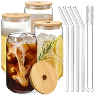 Set of glass jars with bamboo lids and glass straws