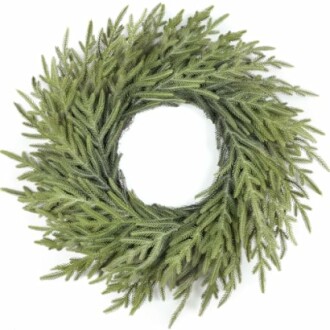 A green wreath made of pine-like foliage