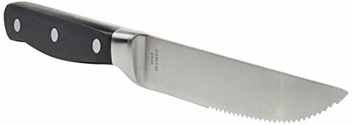 Serrated kitchen knife with a black handle