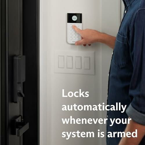 Person using a smart lock system keypad on the wall.