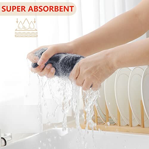 Hands wringing water from a super absorbent towel over a sink